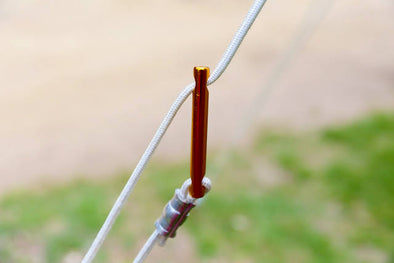 The anodized aluminum adjuster handle. 