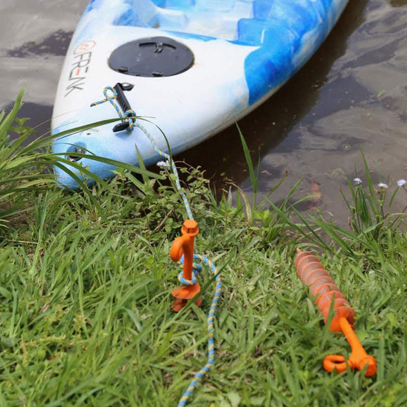 A boat being anchored to the shore using GroundGrabba Lite