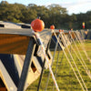 PoleGrabbas from GroundGrabba in use holding up a tent canopy. 