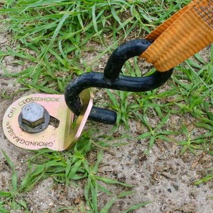 Closed Hook holding down a GroundGrabba ground anchor. 